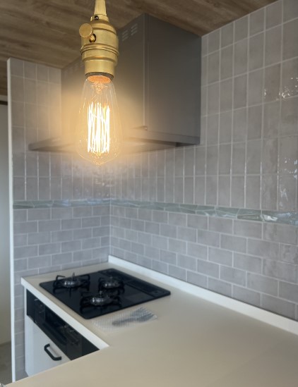 タイルと木のぬくもりが融合した、こだわりの住まい